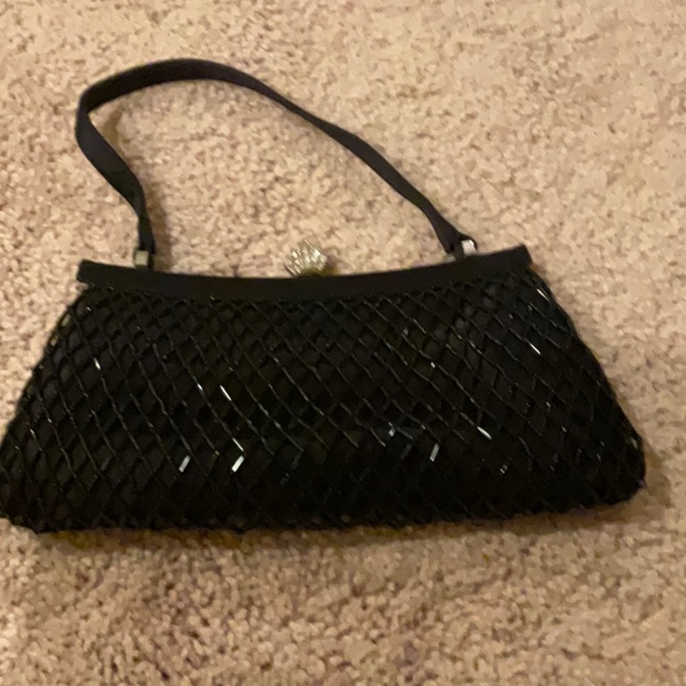 Franchi. Sequined clutch.